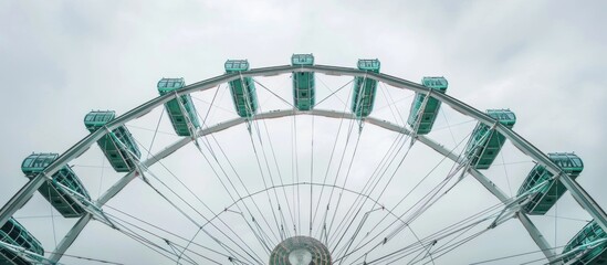 Ferris Wheel Against A Cloudy Sky