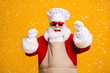© deagreez - Photo of crazy santa claus with beard raise fists win tradition x-mas christmas advent lottery wear chef cap sunglass apron isolated bright shine color background