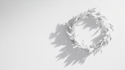 Poster - Clean, soft shadow of a remembrance wreath on a plain white background.