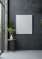 Modern interior with a blank canvas on a dark gray wall. Include a stool and plants. Mock up interior in minimalist style