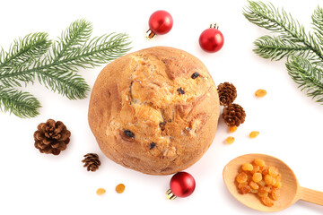 Poster - Tasty Panettone with Christmas balls, fir branches and cones on white background