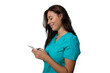 © PeopleVideos - Portrait of a young nurse in scrubs using a smartphone