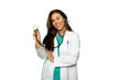© PeopleVideos - Portrait of a young female doctor in a lab coat holding a stethoscope