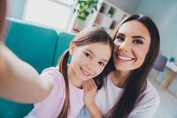 Canvas Print - Photo of adorable good mood family recording video taking selfie indoors living room apartment