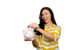 © PeopleVideos - Girl holding a piggy bank as a symbol of financial responsibility