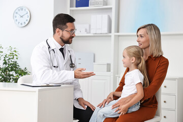 Poster - Doctor consulting little girl and her mother in hospital