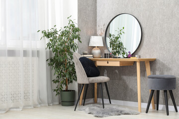 Wall Mural - Mirror, dressing table, lamp, chair and houseplant indoors. Interior design