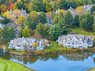 Wall Mural - aerial view of luxury residential community near pond