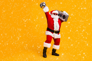 Wall Mural - full length photo of cool santa claus with grey beard listen x-mas christmas songs boom box hold dis