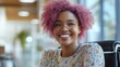 © Pelayo - Inclusive smiling African-American woman in a wheelchair at the office