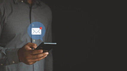 Aufkleber - Email marketing concept. Hand of a businessman using a smartphone for an email with notification alert, an Online communication concept. company sending many e-mails or digital newsletter to customer