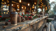 © Loucine - Christmas market with hot coffee on the wooden table with Christmas decoration , Christmas tree on the background and winter mood
