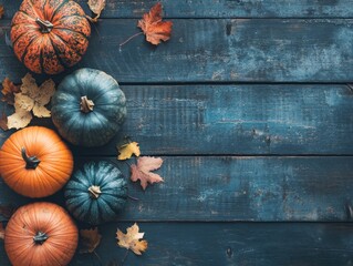 Wall Mural - Autumn composition with pumpkins and leaves on wooden surface flat lay