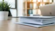 © DWN Media - A stack of papers on an office desk, representing the heavy effort and rigor to create medical marketing materials