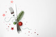 © New Africa - Christmas table setting. Cutlery and festive decor on white background, top view. Space for text