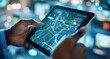 © pisan thailand - Digital map application displayed on tablet device in hand showing city street network and navigation information against a blurred night cityscape background with bright lights and bokeh effects