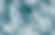 © Fauzi - Shiny silver foil texture. Soft blue foil glass texture background. Abstract gradient bright light reflection and shiny rough texture surface. Glass effect background