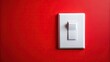 © suchetpong - Low angle closeup of white light switch on red background