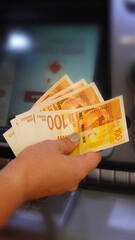 Money Cash Closeup Yellow Hand Holding Currency ATM Banking