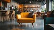 © yusufadi - Yellow armchair in a modern workspace