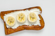 © maxximmm - Sandwich with bananas and whites on . snack breakfast delicious concept. a sandwich with bananas, cream, and slices of white on a . a sandwich with bananas, whites, and slices of whipped a cream on.