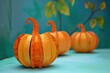 © Vlad - Paper Pumpkin. Kids Halloween Handmade Craft Concept with Autumn Background