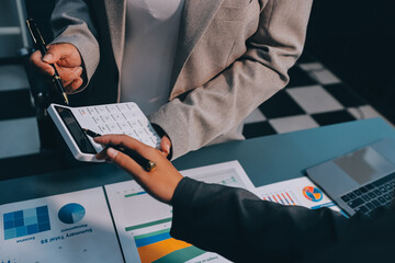 Team of business people are meeting to analyze data for marketing plan,Market research reports and income statistics, Financial and Accounting concept.