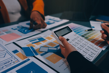 The designer team is designing the uxui system to make the uxui system work well on new phones and support system updates. Website development concept UI UX front end designer