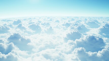 Wall Mural - a serene view of fluffy white clouds bathed in sunlight during a clear day above the horizon