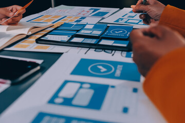 The designer team is designing the uxui system to make the uxui system work well on new phones and support system updates. Website development concept UI UX front end designer