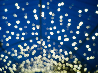 abstract background with lights ,  Bokeh of light bulbs at night