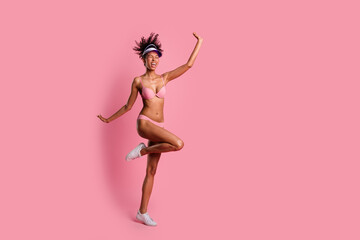 Poster - Full length photo of excited seductive woman underwear cap dancing empty space isolated pink color background