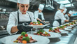 © Alienmonster Images - Focused chef plating gourmet dishes in a professional kitchen, showcasing culinary skills and teamwork