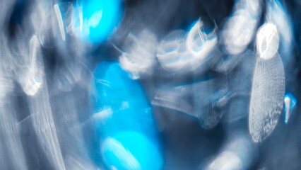 The blue bokeh background color, the warm tone, the sparkling white light are the perfect composition.