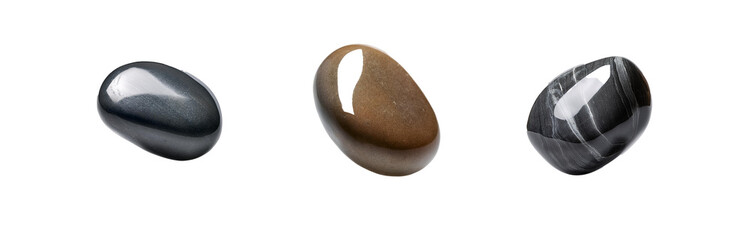 Poster - Three smooth, oval stones in different colors are isolated on a white background.