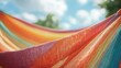 © ALIS ST - A colorful hammock swaying in the summer breeze, with room for copy in the background