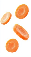 Wall Mural - Sliced carrots falling against a white background creating a vibrant, fresh, and healthy culinary display