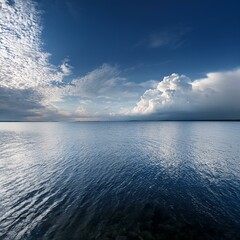 Wall Mural - clouded sky over a peaceful lake gentle ripples and empty horizon 32k full ultra hd high resolution