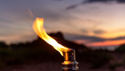 Wall Mural - flickering flame at dusk a vibrant close up of a torch flame illuminating the surroundings with a so