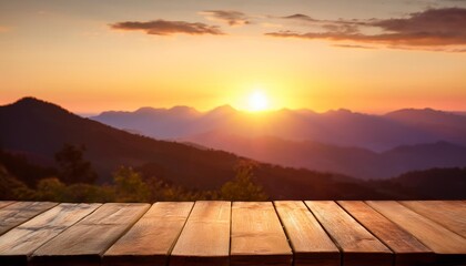 Wall Mural - a vibrant sunset casts warm hues across mountain peaks while a rustic wooden table invites contempla