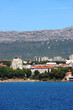 Contemporary buildings, gardens and beaches at the waterfront in Split, Croatia. View of Split from the boat.