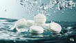 © Sadia - White tablets dissolving in clear water create bubbles in an underwater setting