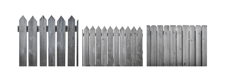 Poster - A weathered wooden fence with pointed tops.