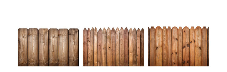 Poster - A wooden fence made of vertical planks with different shapes at the top.