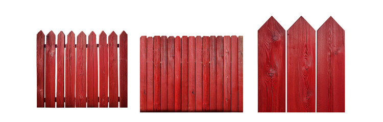 Poster - Three red wooden fences with pointed tops isolated on white background.