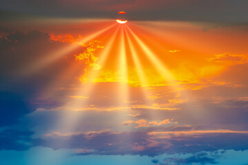 Wall Mural - sunset dramatic sky background with sun and sunset clouds