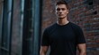 © ANDREI - A mockup of a man in a black T-shirt in gothic look