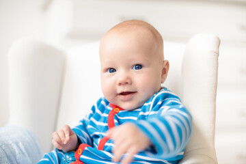 Wall Mural - little baby on white bed