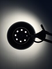 An architect's lamp as an abstract circle