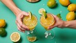 © Pixel Matrix - Close-up image of raised margarita glasses for Cinco de Mayo toast